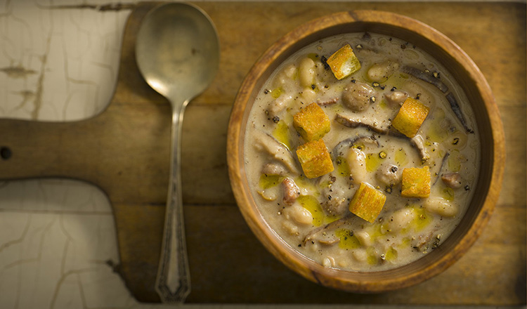 Chestnut, bean and milk soup with mushrooms and rustic croutons.