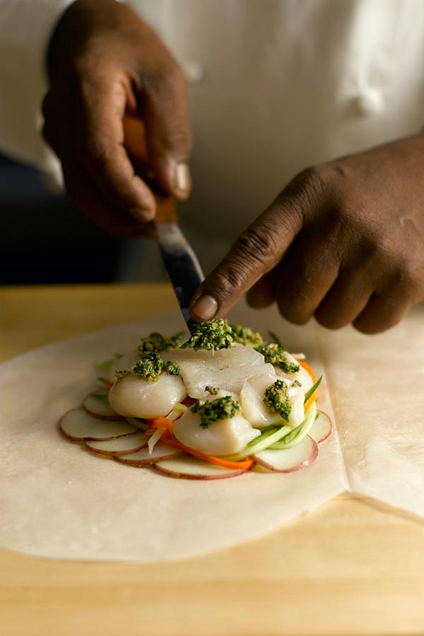 Layering ingredients for cooking in parchment paper