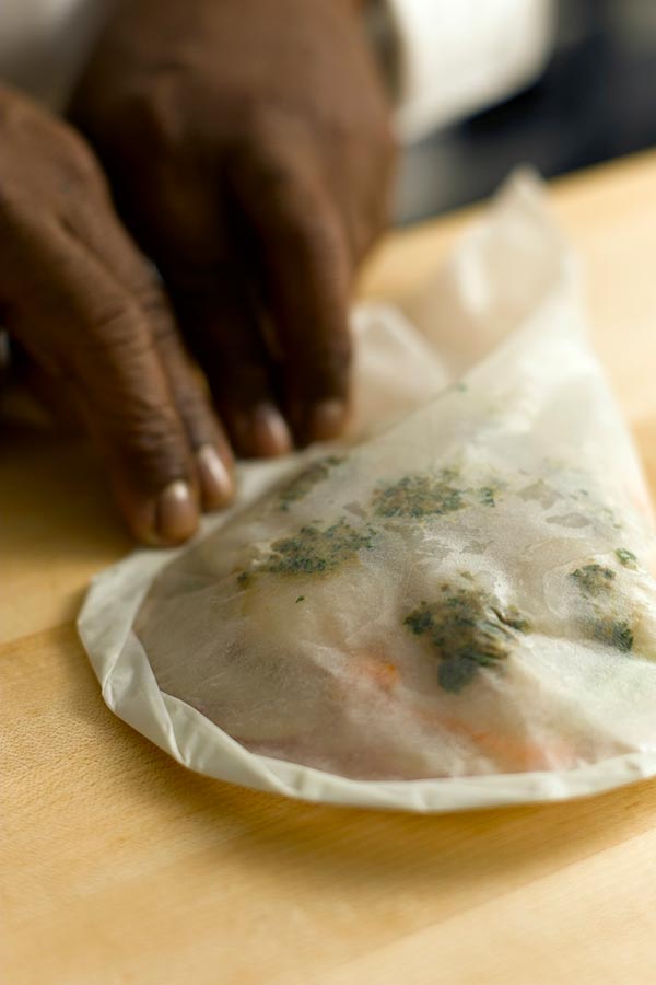 Sealing the edges of a parchment pouch
