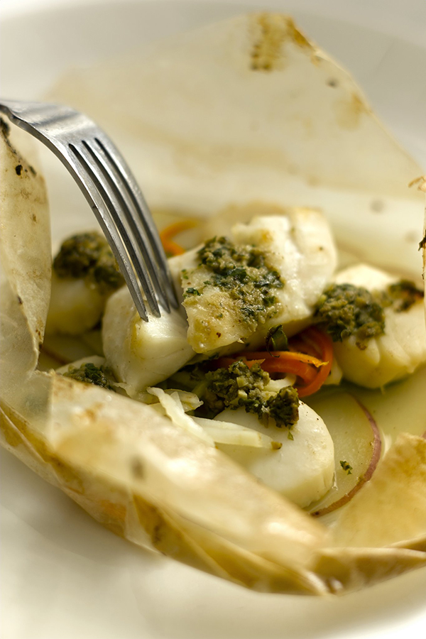 Step three:  Serve en papillote dishes as soon as possible.  For a dramatic presentation, have the server cut open the package in front of the guest.