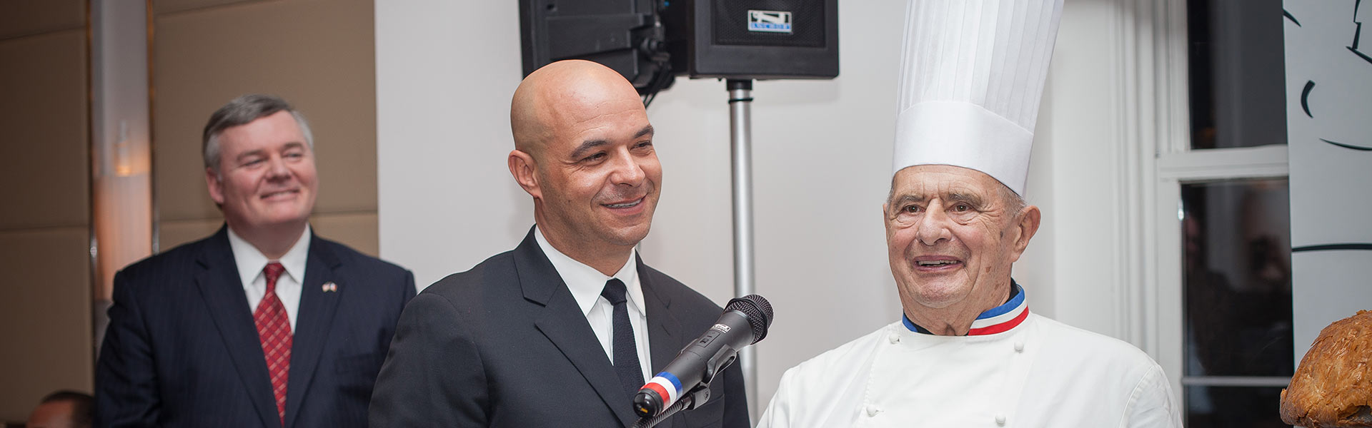 About CIA - People at a Microphone