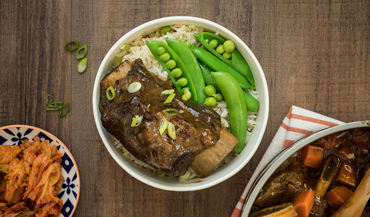 Korean style braised short ribs with rice and sugar snap peas