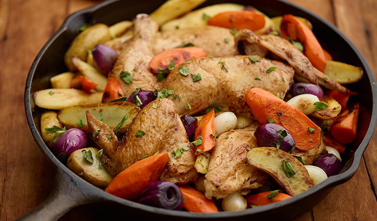 Roasted chicken with vegetables and herbs