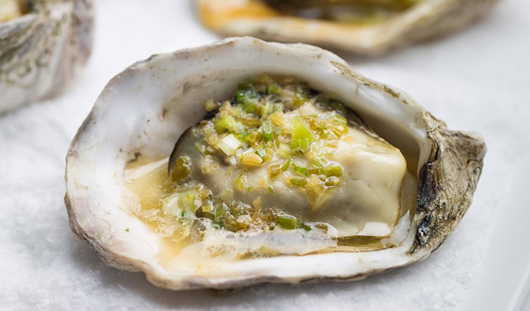 Grilled oysters with scallion butter