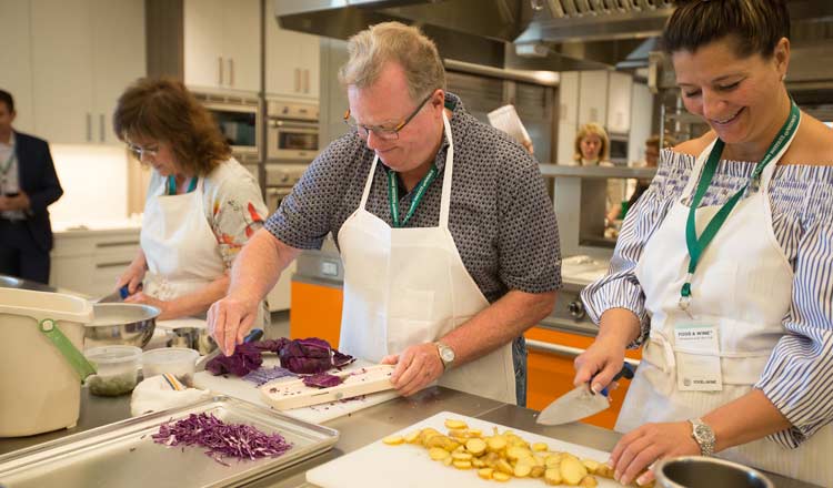 People taking a cooking class at CIA in the Hestian Kitchen