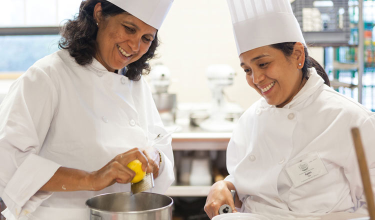 happy people in cooking class