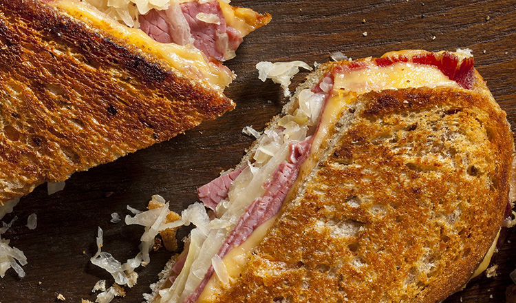 Reuben sandwich cut in half