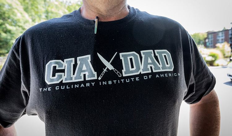 Man in CIA Dad tshirt.