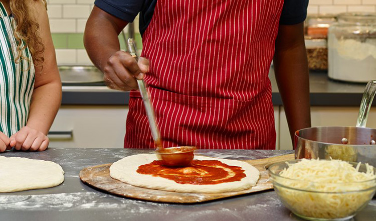 Making pizza.