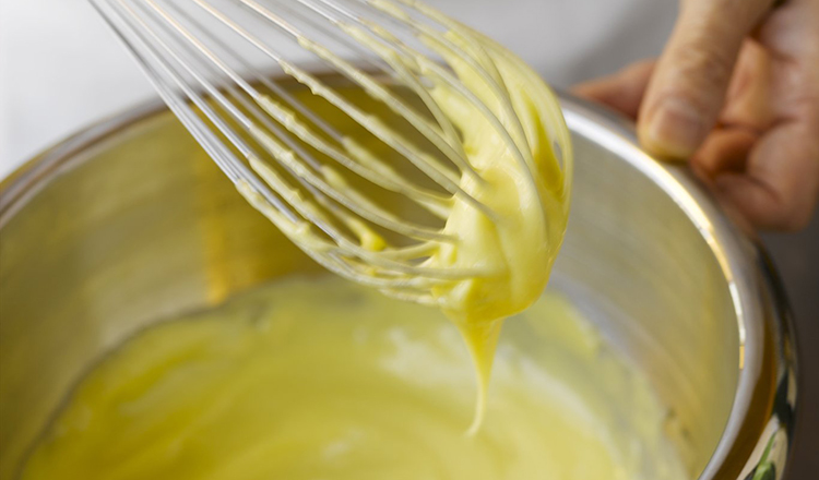 Finished mayonnaise on a whisk