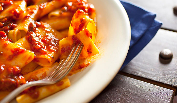 Paccheri pasta with meat and tomato sauce Neapolitan style