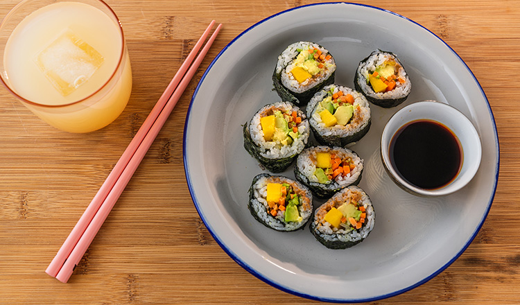 Sushi with almond butter, carrots, avocado, and mango.