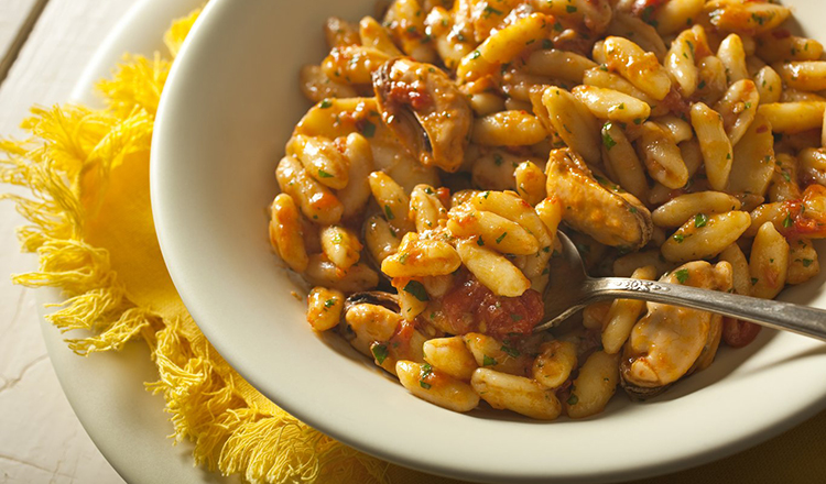 Semolina Dumplings with Potatoes, Mussels and Pecorino Cheese