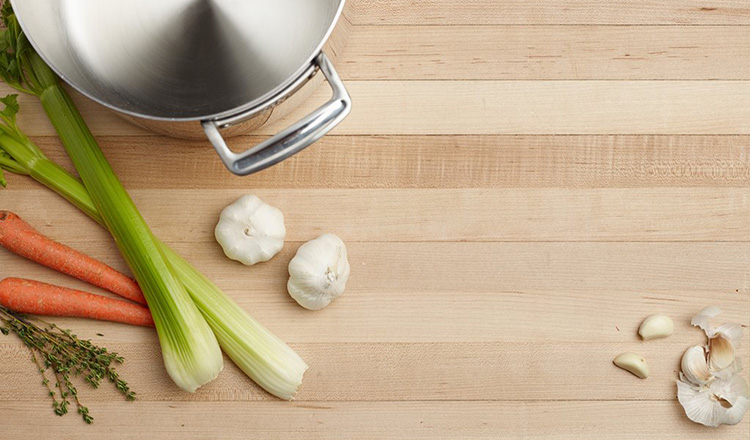 Cutting board with broth ingredients