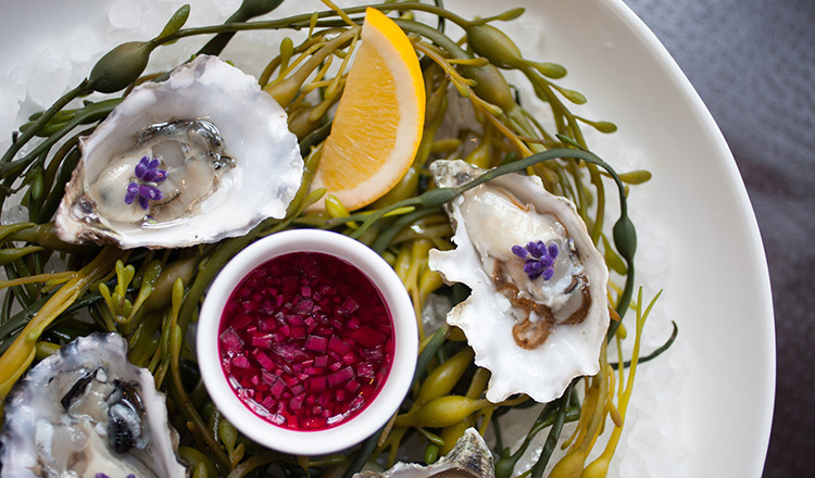 Oysters with flowers and lemon