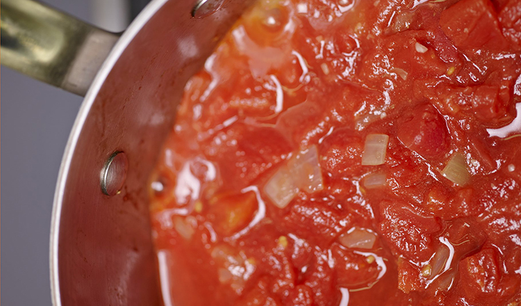 Making tomato sauce.