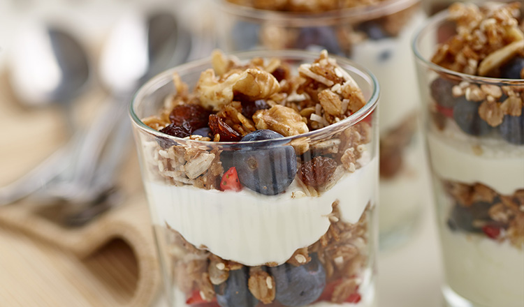 Granola and yogurt parfait with berries