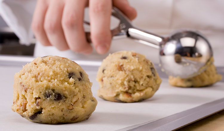 Scooping cookie dough