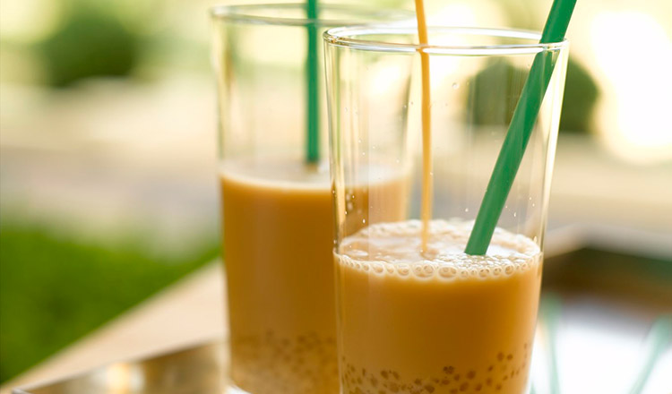 Bubble milk tea with a green straw