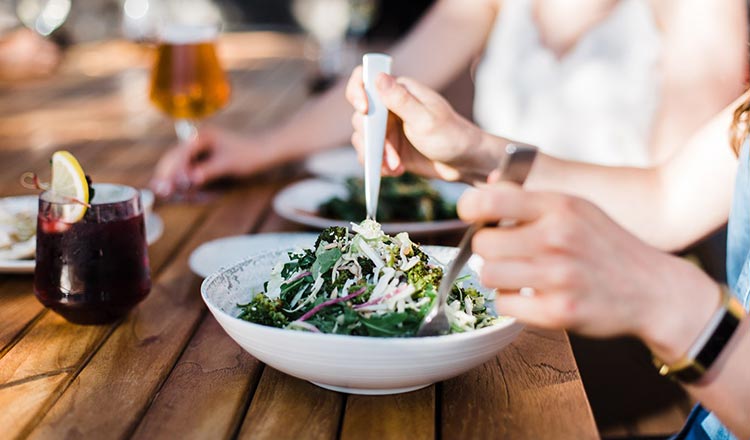 Serving salad outside