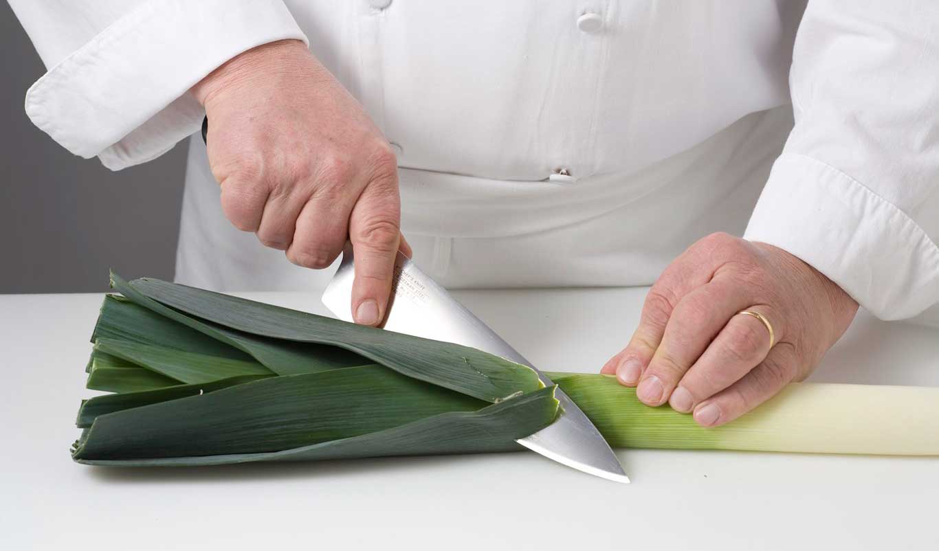 Chef preparing leeks