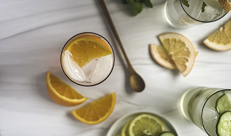 Seltzer with fruit and herbs.