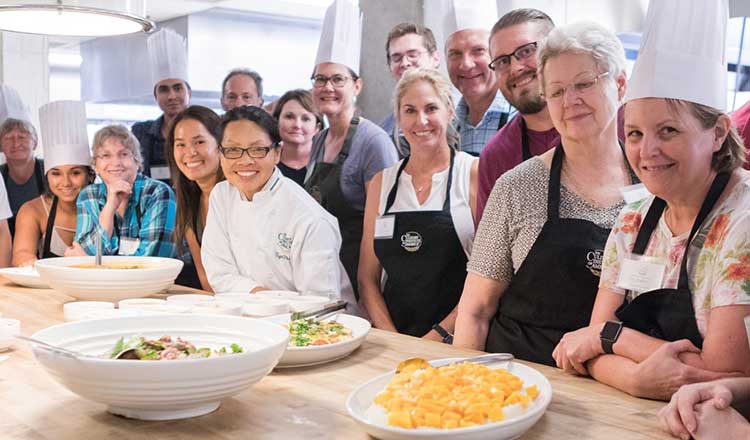 People taking a cooking class at the CIA at the CIA San Antonio