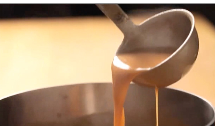 Ladle with lobster bisque
