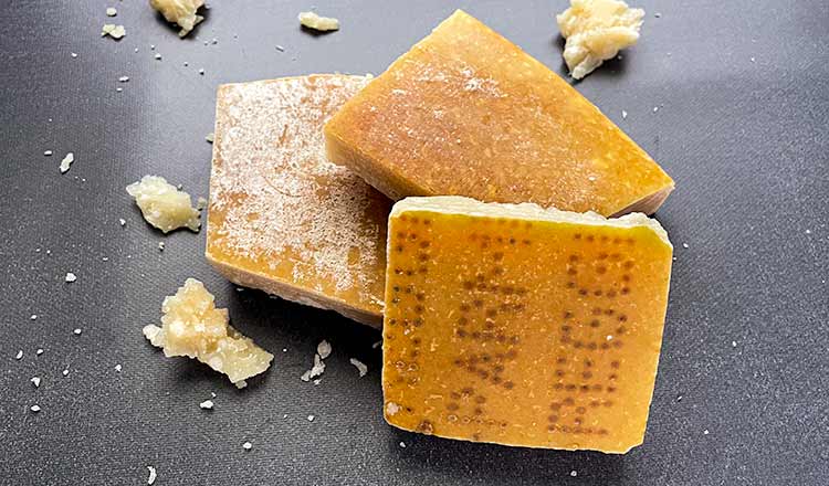 Parmesan Rinds on grey surface