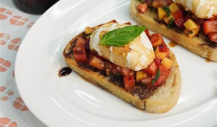 Balsamic Vinegar of Modena bruschette with fruit and burrata