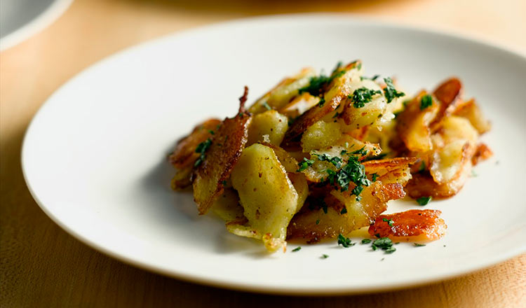 hash brown potatoes on a white plate