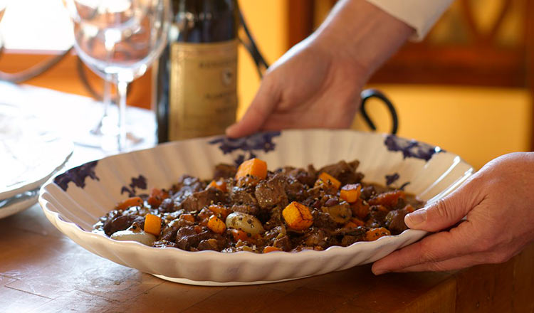 Platter with beef stew with butternut squash