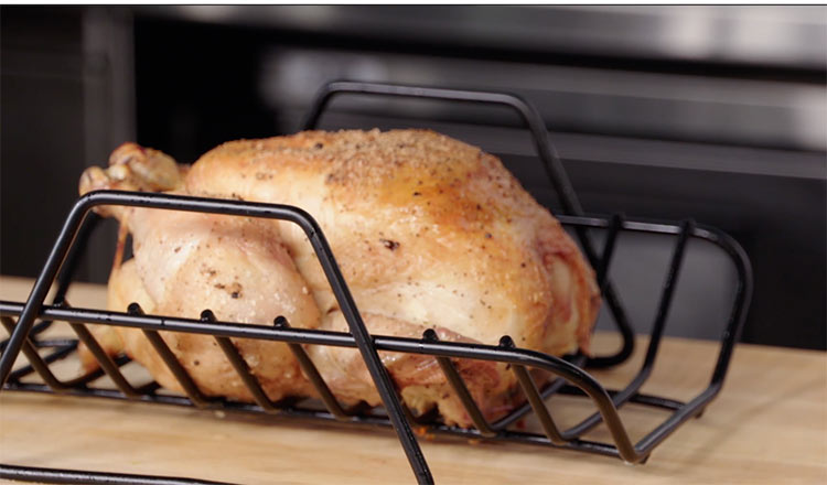 Roasted chicken in a roasting rack