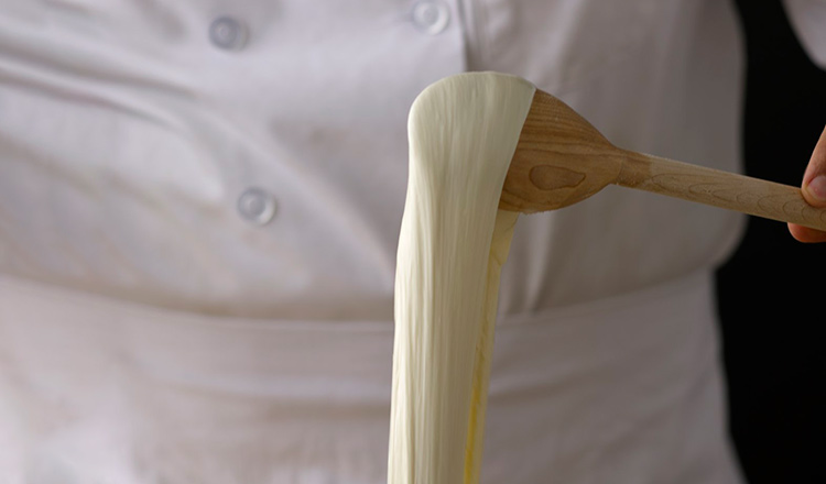 Pulling mozzarella cheese