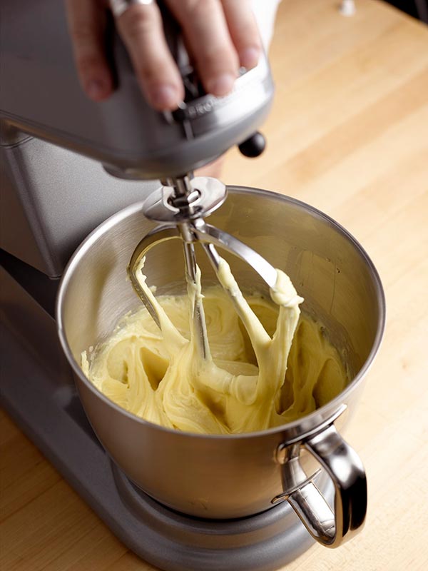 Adding eggs to pate a choux dough