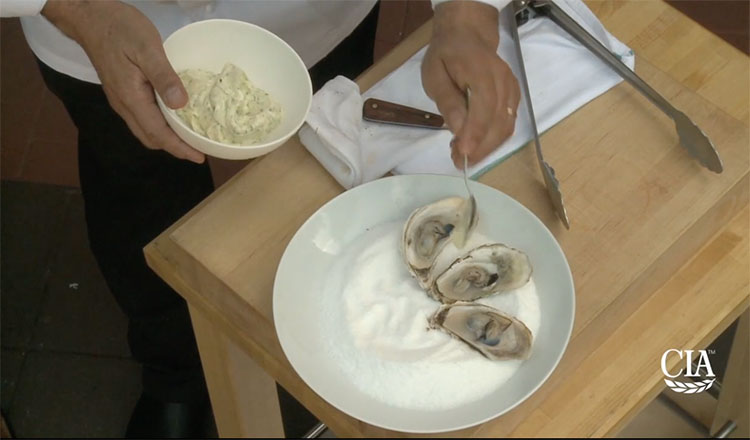 Preparing oysters for grilling