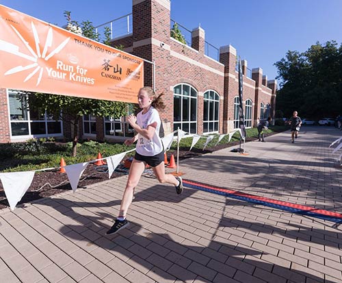 Race runner crossing the finish line