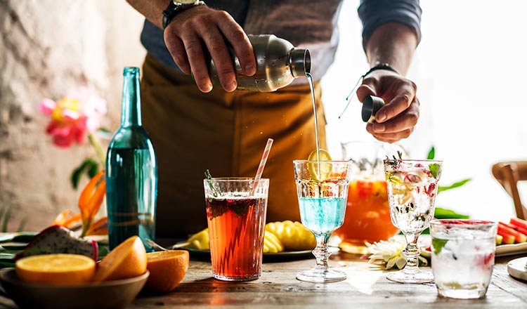 Bartender mixing cocktails