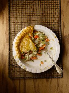 Chicken pot pie in a white ceramic deep dish pie plate