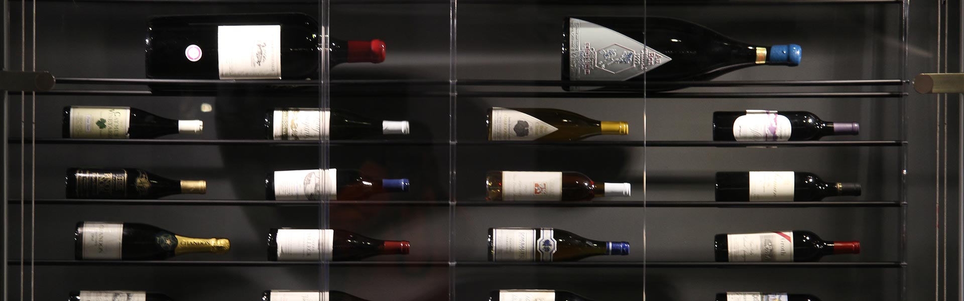 Wine bottles on display in the David and Judy Breitstein Collection at CIA at Copia in Napa, CA.