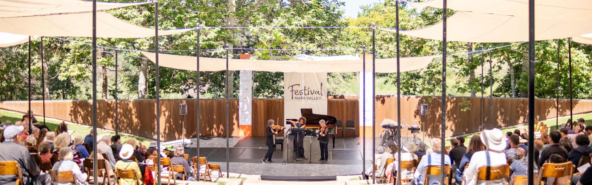 People enjoying a musical show at the Festival Napa Valley at CIA at Copia.